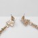 Hanging earrings with the rhinestones "Odyssey" a triangle, the color is white in gold