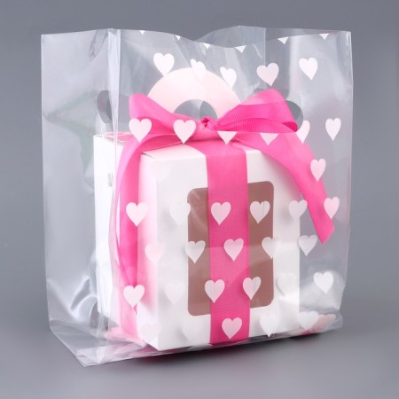 Polyethylene square package with a cut handle, packaging, "hearts", 15x25+6cm ± 5% 60 μm-1