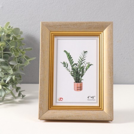 Photo frame plastic 10x15 cm "Gabriel" Golden with a gold strip 2.2x14x19 cm
