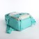 School set. A backpack with a zipper, a chover, bag, a pencil case, a bag for coins, the color is turquoise