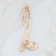 Brooch "Nota", white color in gold