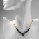 A decarative -based pendant -basis “flower” amelia, black color in gold, 45cm