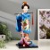 Collector doll "Japanese in a silk blue kimono with flute" 30x12.5x12.5 cm