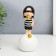 Polystone souvenir "Baby in a black cap, with a gold bubble on the ball" 15x7x7 cm