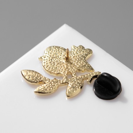Bird icon on a twig, white color in gold-1