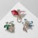 Brooch "Flower Books", Mix shape, Mix color in gold (indivisible packing 12 pcs., Price per pcs.)