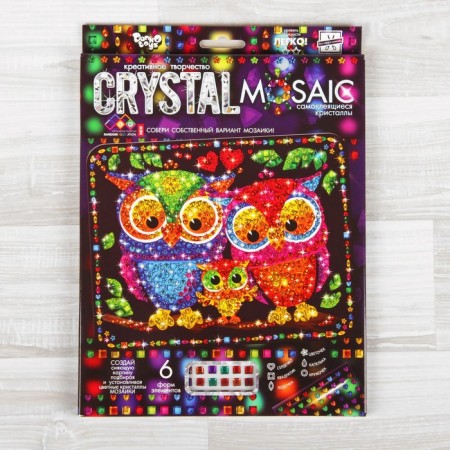 Set for creating the mosaic "Owls" Crystal Mosaic, against a dark background