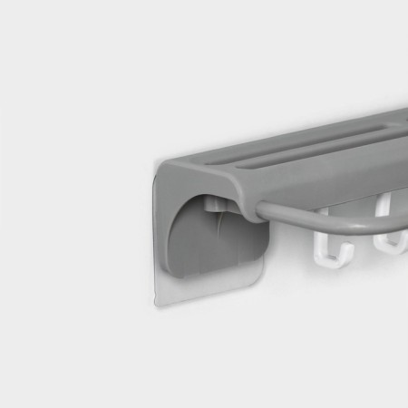 Holder for kitchen accessories with a holder for towels-2