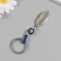 Keychain from the evil eye Metal "leaf" 2.2x7.5 cm