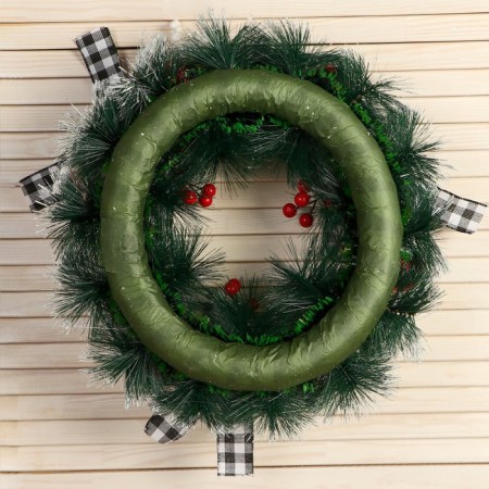 New Year's wreath d- 33 cm "Cozy fairy tale" bows in a cage with cones-2