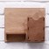 The keywood is wall -mounted with the pocket shelf.
