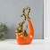 Souvenir ceramics "Elephants with heart. Abstraction" Orange with gold 7x18.5x25.5 cm