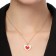 The pendant "Heart" is double, the color is red-white in gold, 40 cm