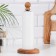 Paper towel holder treated with oil