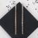 Hanging earrings with the rhinestones “path” minimal, white color in gold, 11 cm