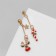 Earrings "Deer and Lollipop" hanging, red-green color in gold