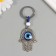 Keychain from the evil eye metal "Fatima hand" 4x8.2 cm