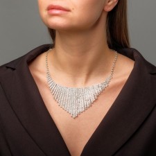 The necklace is whole, the color is white in silver, 30 cm