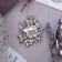 Brooch "Rhombus" with leaves, the color is gray in silver