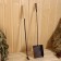 Set of ash and poker with a wooden handle