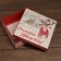 The box is folding, the cover is the "happy New Year" 20 x 20 x 6 cm