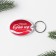 A keychain with an insert “Such a year”, 5 x 4 cm.