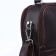 Cross-Bodi Bag on a zipper, the color is dark brown