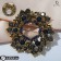 Brooch "Empress" circle with roses, the color is gray-blue in black gold
