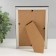 Photo frame plastic 10x15 cm "Black marble with a gold frame" 12x17 cm