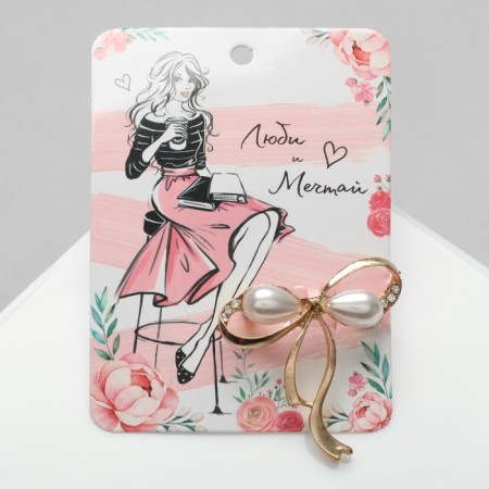 Brooch "Bow" with pearls, white color in gold