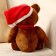 Soft toy "Bear", in the New Year's cap, 20 cm, brown color