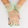 Carnival accessory - transparent gloves with a skirt, green color