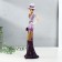 Polystone souvenir "Lady in a lilac-violet dress, in a hat, with a clutch" 9.5x9x32 cm