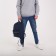 A backpack with a zipper, "saxi", outer pocket, blue color