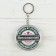 A keychain opener for keys "invincible", diam. 5.8 cm
