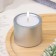Candle "Cylinder" in a candlestick of gypsum is small, 5x3.5cm, silver