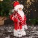 Santa Claus "In a sweater with deer and flashlight" 30 cm, white-red