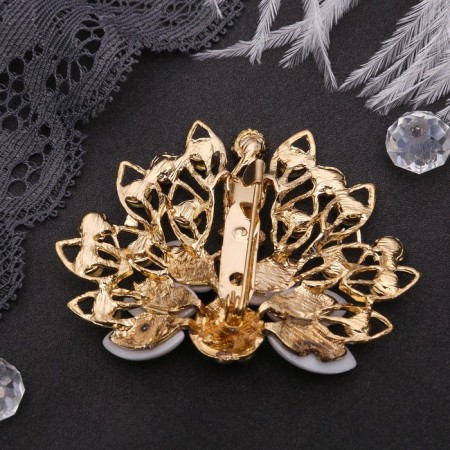 Brooch "Peacock" with a fluffy tail, white-radiant color in gold-2