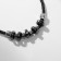 The pendant on the unisex cord is hematite, the length is regulated, 35 cm