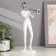 Polystone souvenir "Musician with saxophone" White with silver 29.5x10.5x13.5 cm