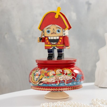 New Year. Musical souvenir "Nutcracker", three red, manual painting