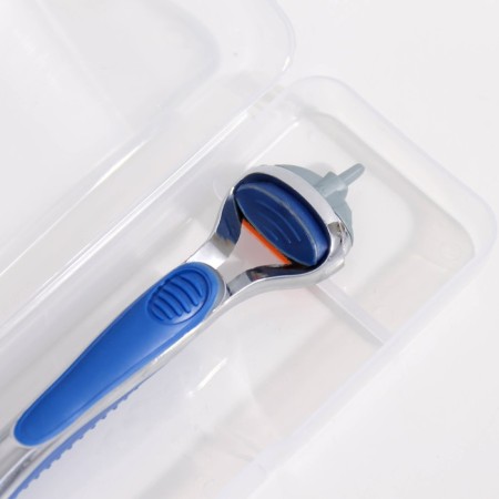 The machine is a razor and 12 interchangeable cassettes of blades, compatible with Gillette Fusion-2