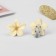 Clips children's "chosen" flower, beige color