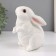 The piggy bank "Rabbit No. 3 is white (paws down)" height 16 cm, width 10.5 cm, length 12.5 cm