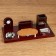 Table set 6V1 with a business card holder and clock, red tree