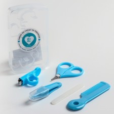 A child’s care set, 5 items (comb, tweezers, scissors, a knipser, a file), the color of the blue