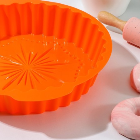 The form for baking is the “corrugated circle. Star ", silicone, 29 × 28 cm, with handles, color mix-2