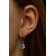 Earrings with bloom rhinestones hanging, white color in silver
