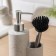 A dispenser for a detergent with a “minimum” brush, 400 ml, white color