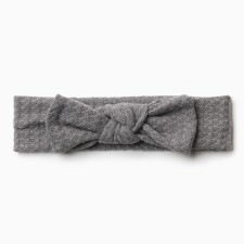 A bandage on the head of a baby I am a “bow”, a clear gray one. Rr. 46-48